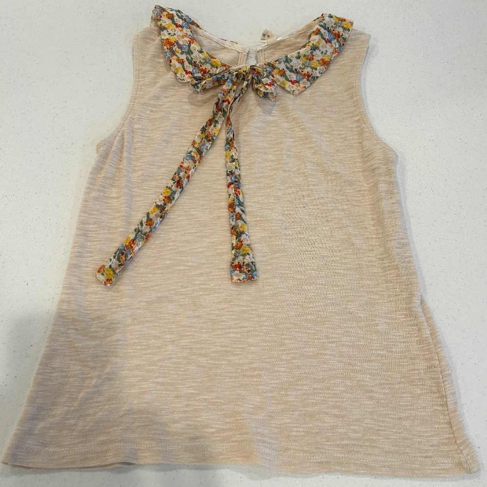 Very cute Love Dove flowered neckline; keyhole back sleeveless knit blouse